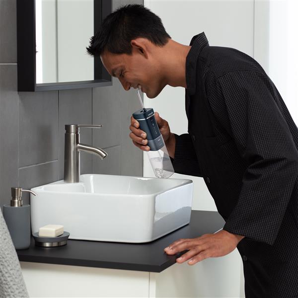 Blue Waterpik? Cordless Slide Professional Water Flosser