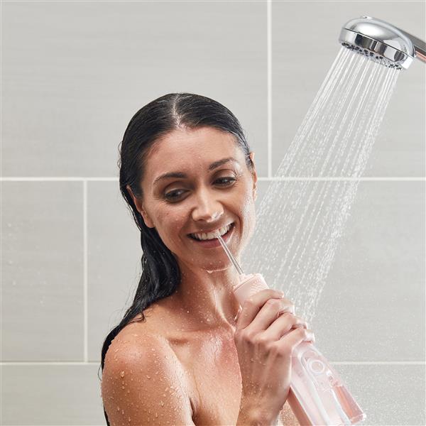 Pink Waterpik™ Cordless Revive Water Flosser